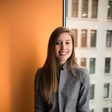 Representative stock portrait, not the named author