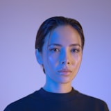 Representative stock portrait, not the named author