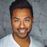 Representative stock portrait, not the named author